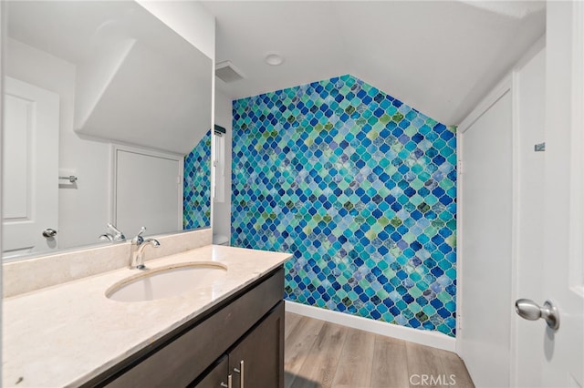 3908 Boulder Dr, Jurupa Valley, CA 92509 - full bath with vanity and wood finished floors