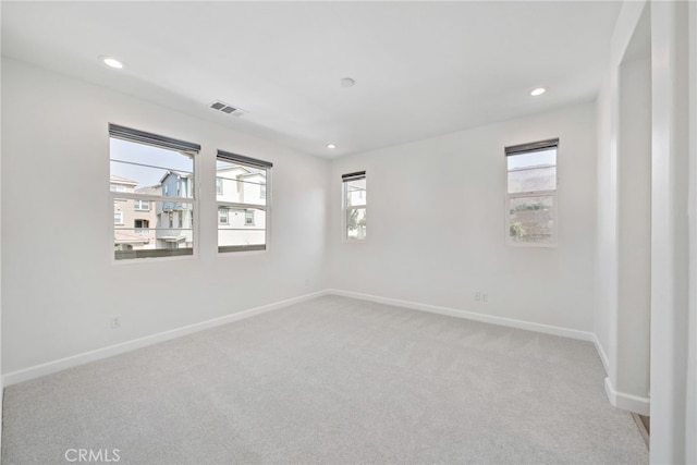 3908 Boulder Dr, Jurupa Valley, CA 92509 - spare room with light carpet and recessed lighting
