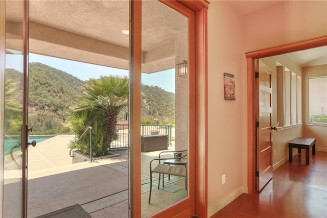 4570 Christine Loomis Dr, Arroyo Grande, CA 93420 - doorway featuring a mountain view and baseboards