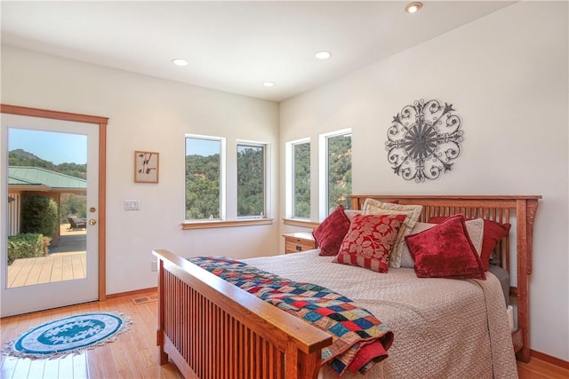 4570 Christine Loomis Dr, Arroyo Grande, CA 93420 - bedroom featuring multiple windows, access to outside, light wood-style flooring, and recessed lighting
