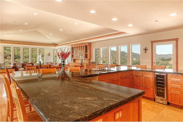 4570 Christine Loomis Dr, Arroyo Grande, CA 93420 - kitchen featuring wine cooler, healthy amount of natural light, a raised ceiling, and recessed lighting