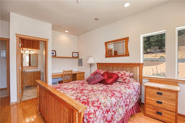 4570 Christine Loomis Dr, Arroyo Grande, CA 93420 - bedroom featuring light wood-style flooring, recessed lighting, and ensuite bath