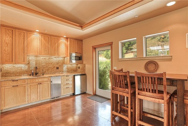 4570 Christine Loomis Dr, Arroyo Grande, CA 93420 - kitchen featuring appliances with stainless steel finishes, tasteful backsplash, light stone countertops, recessed lighting, and a tray ceiling
