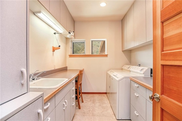 4570 Christine Loomis Dr, Arroyo Grande, CA 93420 - laundry area featuring cabinet space, washing machine and clothes dryer, and light tile patterned flooring