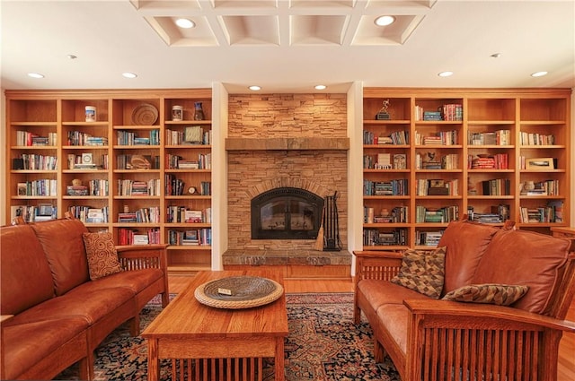 4570 Christine Loomis Dr, Arroyo Grande, CA 93420 - sitting room featuring coffered ceiling, recessed lighting, wood finished floors, a fireplace, and bookshelves