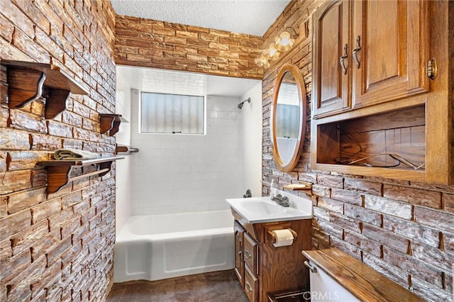 9649 Grace St, Fontana, CA 92335 - bathroom with vanity, tub / shower combination, and a textured ceiling
