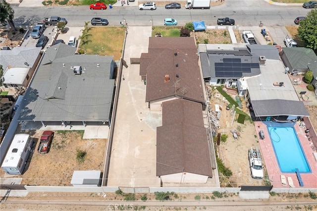 9649 Grace St, Fontana, CA 92335 - aerial perspective of suburban area featuring a pool area