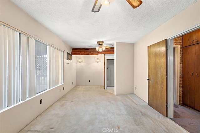 9649 Grace St, Fontana, CA 92335 - unfurnished bedroom featuring carpet flooring, a textured ceiling, and ceiling fan