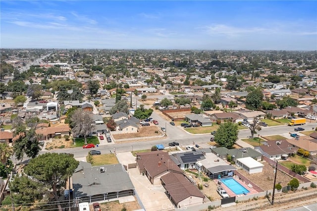 9649 Grace St, Fontana, CA 92335 - aerial perspective of suburban area with a pool area