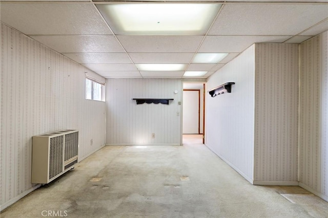 9649 Grace St, Fontana, CA 92335 - basement featuring heating unit, a paneled ceiling, and carpet