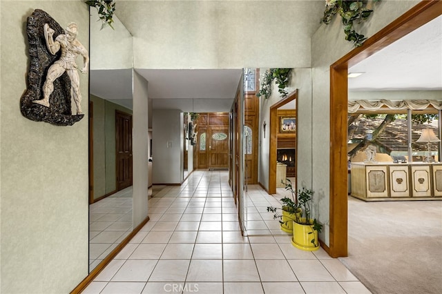 1146 Sandhurst Ln, La Verne, CA 91750 - corridor with light tile patterned flooring and a towering ceiling