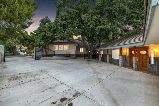 1146 Sandhurst Ln, La Verne, CA 91750 - view of front facade featuring stucco siding and stone siding