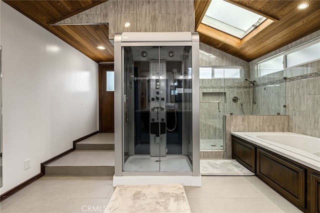 1146 Sandhurst Ln, La Verne, CA 91750 - bathroom featuring lofted ceiling, a bath, a shower stall, wood ceiling, and a skylight