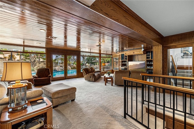 1146 Sandhurst Ln, La Verne, CA 91750 - living area featuring wood walls, carpet, and french doors