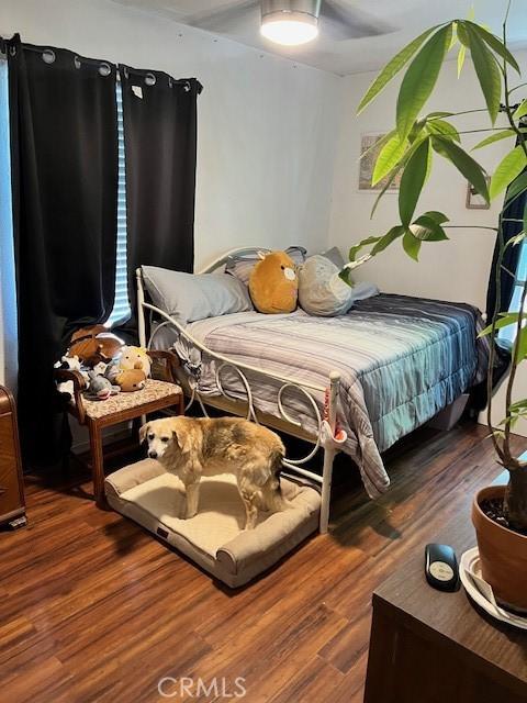 1550 W 21st St, San Bernardino, CA 92411 - bedroom with wood finished floors