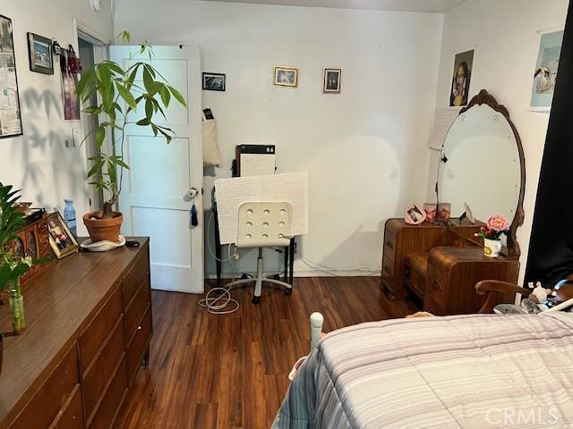 1550 W 21st St, San Bernardino, CA 92411 - bedroom featuring wood finished floors