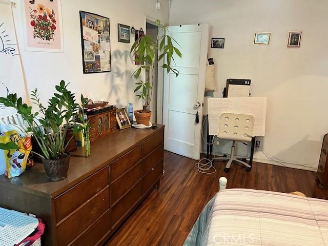 1550 W 21st St, San Bernardino, CA 92411 - bedroom with wood finished floors