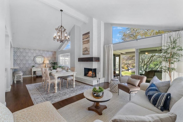 1247 La Casa Dr, San Marcos, CA 92078 - living area featuring wallpapered walls, healthy amount of natural light, wood finished floors, beamed ceiling, and a brick fireplace