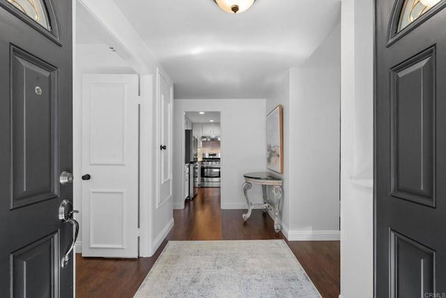 1247 La Casa Dr, San Marcos, CA 92078 - entrance foyer featuring dark wood-type flooring and baseboards