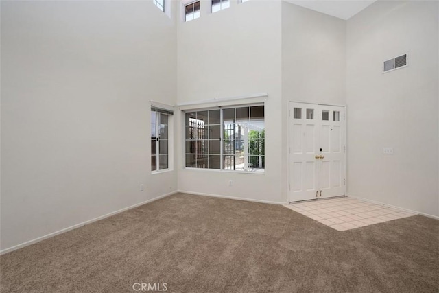 25134 Calle Viejo, Murrieta, CA 92563 - entryway with carpet flooring and a towering ceiling