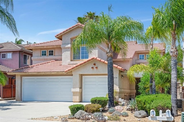 25134 Calle Viejo, Murrieta, CA 92563 - view of front of home featuring stucco siding, a tiled roof, and driveway