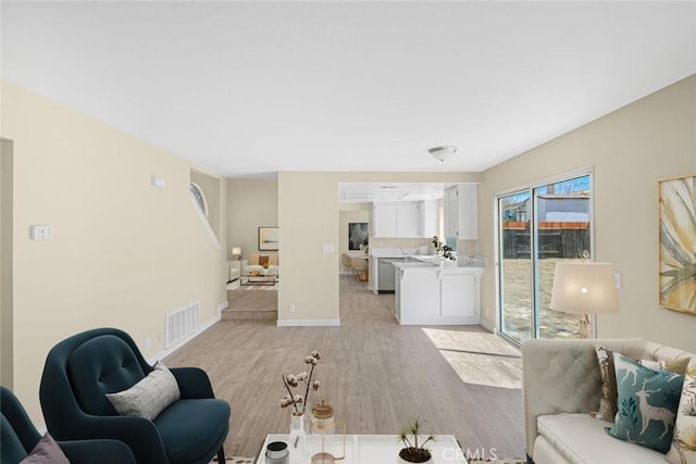 2608 W Oldfield St, Lancaster, CA 93536 - living area with light wood finished floors and baseboards