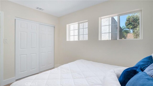 815 N Hagar St, San Fernando, CA 91340 - bedroom with a closet and baseboards