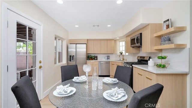 815 N Hagar St, San Fernando, CA 91340 - kitchen with light brown cabinets, stainless steel appliances, modern cabinets, recessed lighting, and light countertops