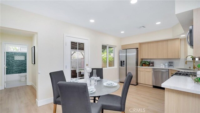 815 N Hagar St, San Fernando, CA 91340 - dining space featuring light wood-style floors and recessed lighting