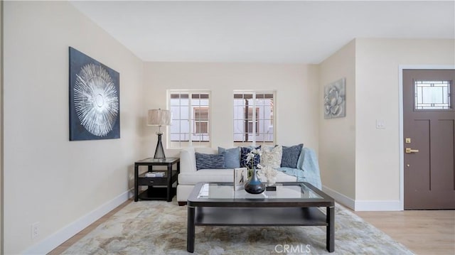 815 N Hagar St, San Fernando, CA 91340 - living area with baseboards and wood finished floors