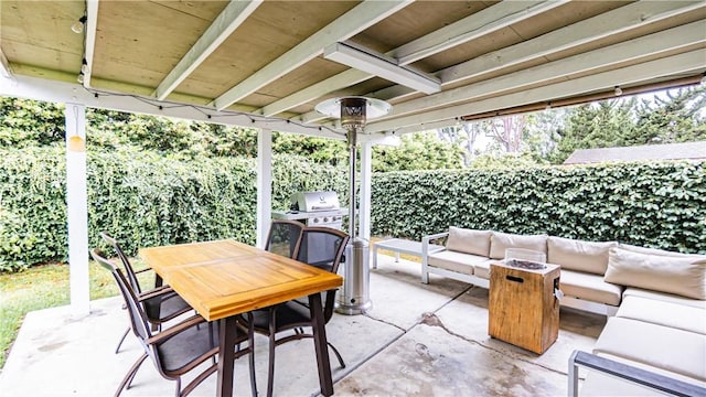 937 Dahlia Ave, Costa Mesa, CA 92626 - fenced backyard featuring an outdoor living space with a fire pit, a patio area, outdoor dining area, and grilling area