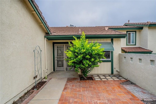 2648 Condor Cir, Corona, CA 92882 - property entrance with stucco siding and a patio area