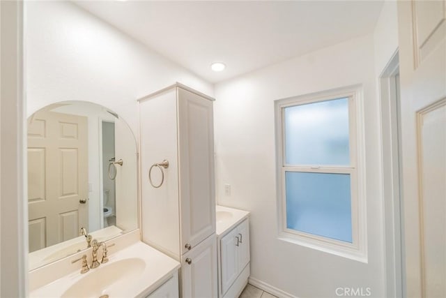 2648 Condor Cir, Corona, CA 92882 - bathroom featuring two vanities and toilet