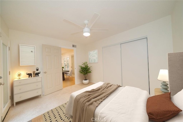 2648 Condor Cir, Corona, CA 92882 - bedroom with a closet, light colored carpet, and ceiling fan