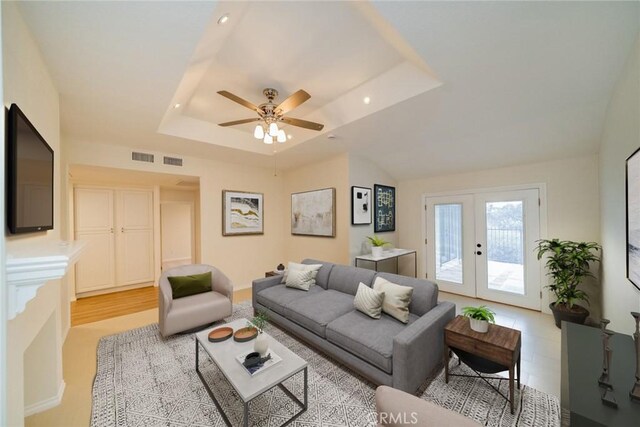 2648 Condor Cir, Corona, CA 92882 - living room featuring a tray ceiling, french doors, a ceiling fan, and recessed lighting