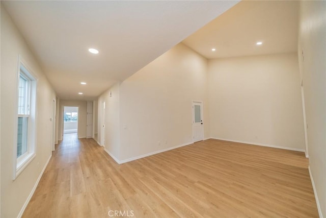 2648 Condor Cir, Corona, CA 92882 - unfurnished living room featuring light wood-type flooring and recessed lighting