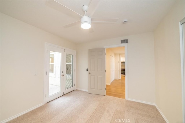 2648 Condor Cir, Corona, CA 92882 - unfurnished room with light colored carpet, a smoke detector, and ceiling fan