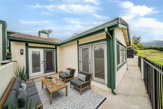 2648 Condor Cir, Corona, CA 92882 - back of house with a chimney, stucco siding, french doors, outdoor lounge area, and a patio