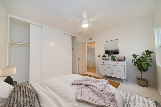 2648 Condor Cir, Corona, CA 92882 - bedroom featuring a closet, carpet floors, and a ceiling fan