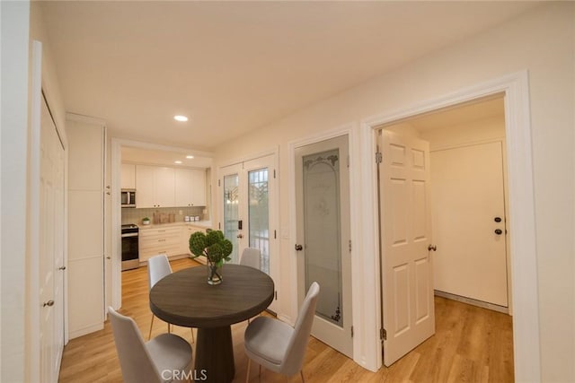 2648 Condor Cir, Corona, CA 92882 - dining space with light wood-type flooring and recessed lighting