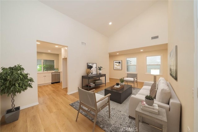 2648 Condor Cir, Corona, CA 92882 - living area with light wood finished floors, high vaulted ceiling, and recessed lighting