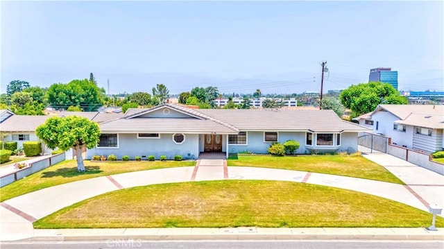 2837 E Mesa Dr, West Covina, CA 91791 - ranch-style home featuring a tile roof, curved driveway, and stucco siding