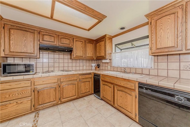 2837 E Mesa Dr, West Covina, CA 91791 - kitchen with dishwasher, stainless steel microwave, gas cooktop, under cabinet range hood, and backsplash