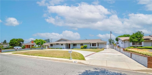2837 E Mesa Dr, West Covina, CA 91791 - ranch-style home with concrete driveway and a front lawn