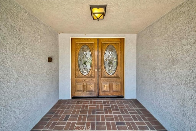 2837 E Mesa Dr, West Covina, CA 91791 - view of exterior entry featuring french doors and stucco siding