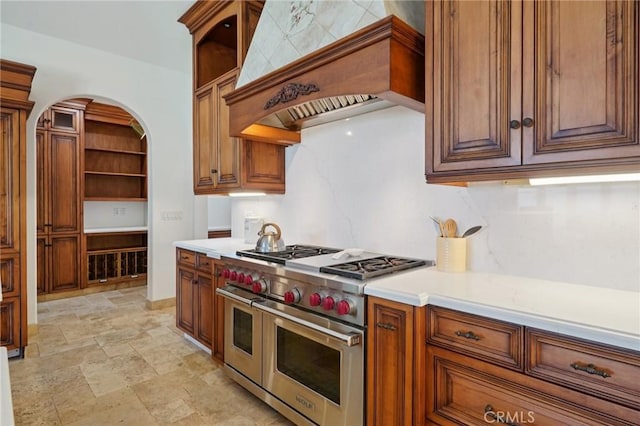 6337 Via Colinita, Rancho Palos Verdes, CA 90275 - kitchen featuring double oven range, premium range hood, light countertops, and light stone finish floors