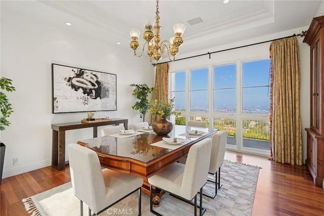 6337 Via Colinita, Rancho Palos Verdes, CA 90275 - dining area with wood finished floors, a chandelier, recessed lighting, a raised ceiling, and crown molding