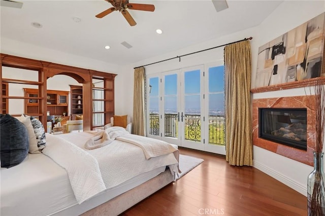 6337 Via Colinita, Rancho Palos Verdes, CA 90275 - bedroom featuring access to outside, wood finished floors, recessed lighting, a premium fireplace, and ceiling fan