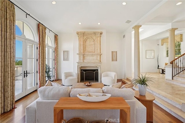 6337 Via Colinita, Rancho Palos Verdes, CA 90275 - living area with decorative columns, healthy amount of natural light, a fireplace, recessed lighting, and wood finished floors