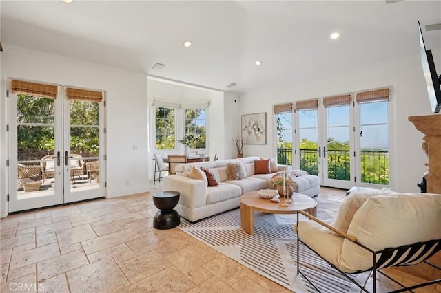 6337 Via Colinita, Rancho Palos Verdes, CA 90275 - living room with french doors, plenty of natural light, stone tile flooring, and recessed lighting